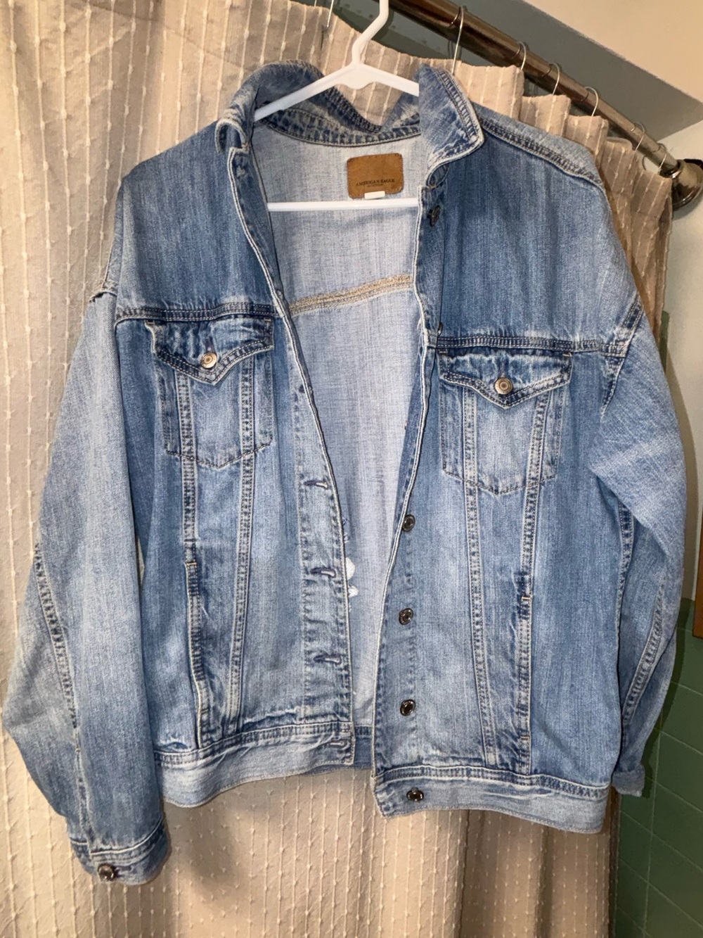 Denim jacket with bandana-printed back